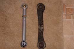 OEM arm on right versus new RE arm on left.