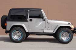 Jeep with 33 inch Wrangler MT/R on Tailgunner Wheel